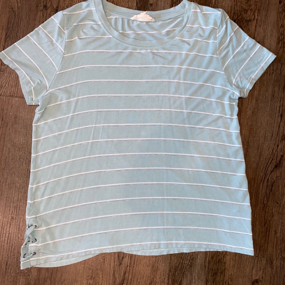Blue shirt with gray and white stripes